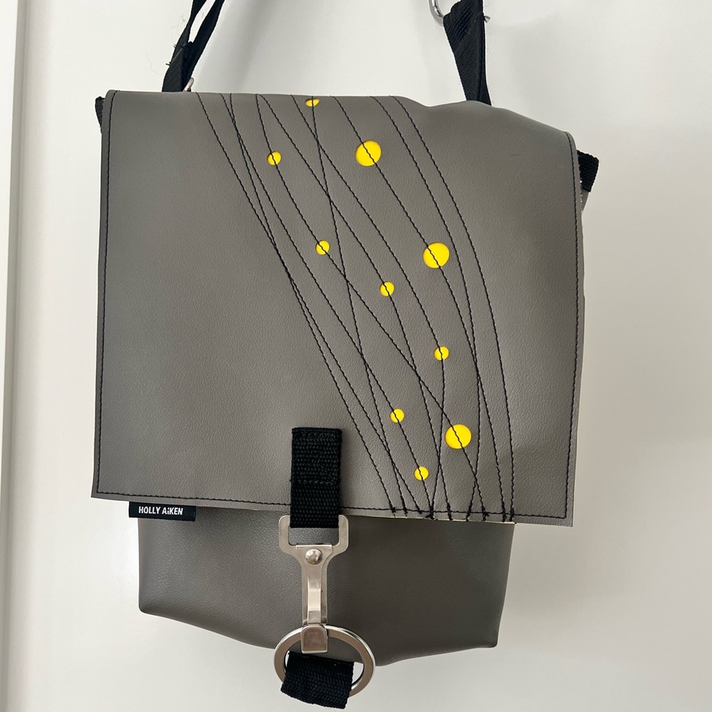 Gray Backpack with Yellow Accents